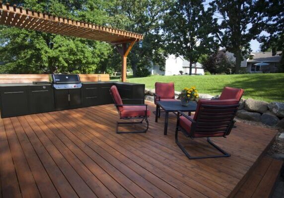 Backyard deck and pergola landscaping.